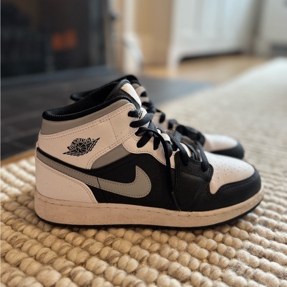 Jordan Black and White Mid-Top Sneakers